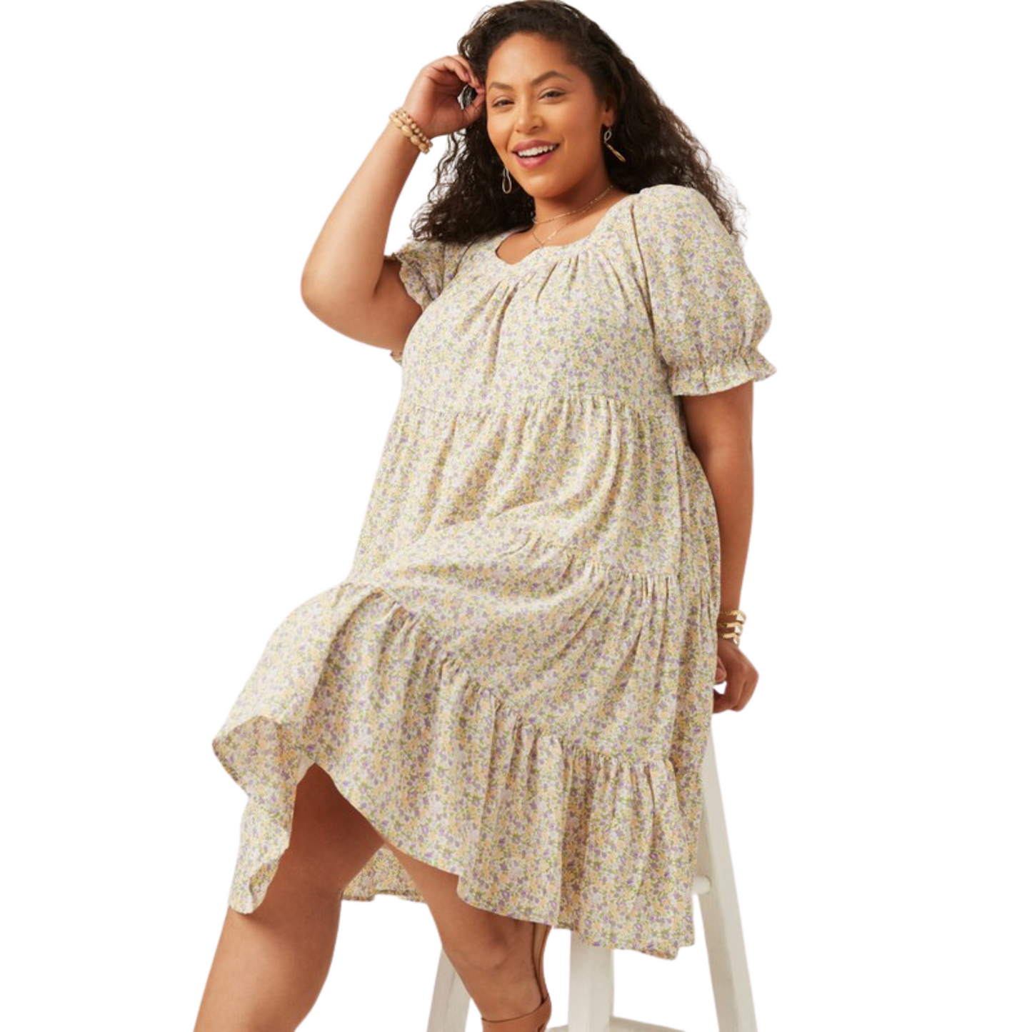 Make a statement with the Ditsy Floral Tiered Dress. It features a romantic print with a flattering off white color, plus size design, and full tiers for a beautiful look. Perfect for special occasions or an everyday style.