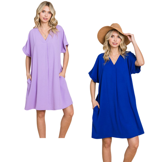 plus size dolman mini dress. Available in lavender and royal blue