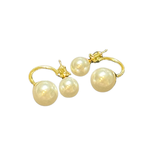 These elegant stud earrings feature a sophisticated double pearl design set in a refined gold setting. Perfectly balancing classic charm with modern style, they add a subtle yet distinctive accent to any outfit. Ideal for both everyday wear and special occasions, these earrings offer timeless appeal with expert craftsmanship.