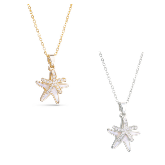 This Double Starfish Necklace is the perfect accessory for any beach lover. Its elegant design features two starfish adorned with mother of pearl and sparkling rhinestone accents. Available in both silver and gold, this necklace is sure to add a touch of ocean-inspired charm to any outfit.