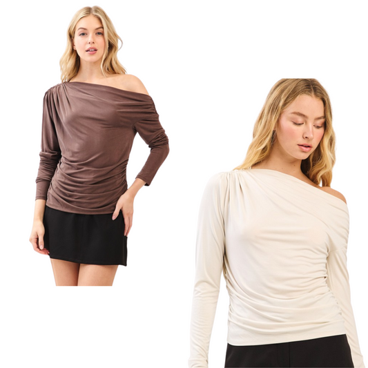 This Long Sleeve Drape Knit Top from Mittoshop combines elegant design with versatile comfort. Featuring a chic one-shoulder cut and long sleeves, it offers a sophisticated silhouette ideal for both casual and dressier occasions. Available in classic cream and rich espresso, this top adapts seamlessly to your wardrobe, ensuring effortless style and refined appeal.