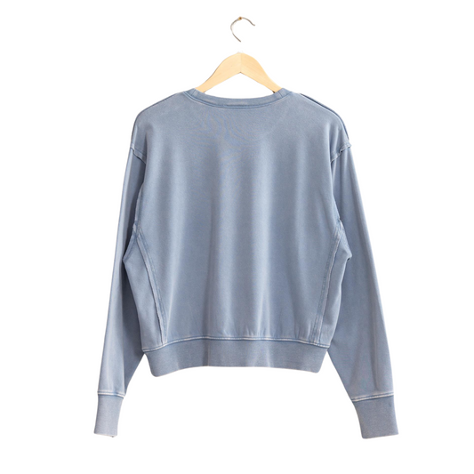 The HYFVE Drop Shoulder Sweatshirt features a classic crew neck design and long sleeves for a cozy and comfortable fit. Its trendy gray blue color adds a touch of style to any outfit. Perfect for casual wear or layering, this sweatshirt is a must-have addition to your wardrobe.