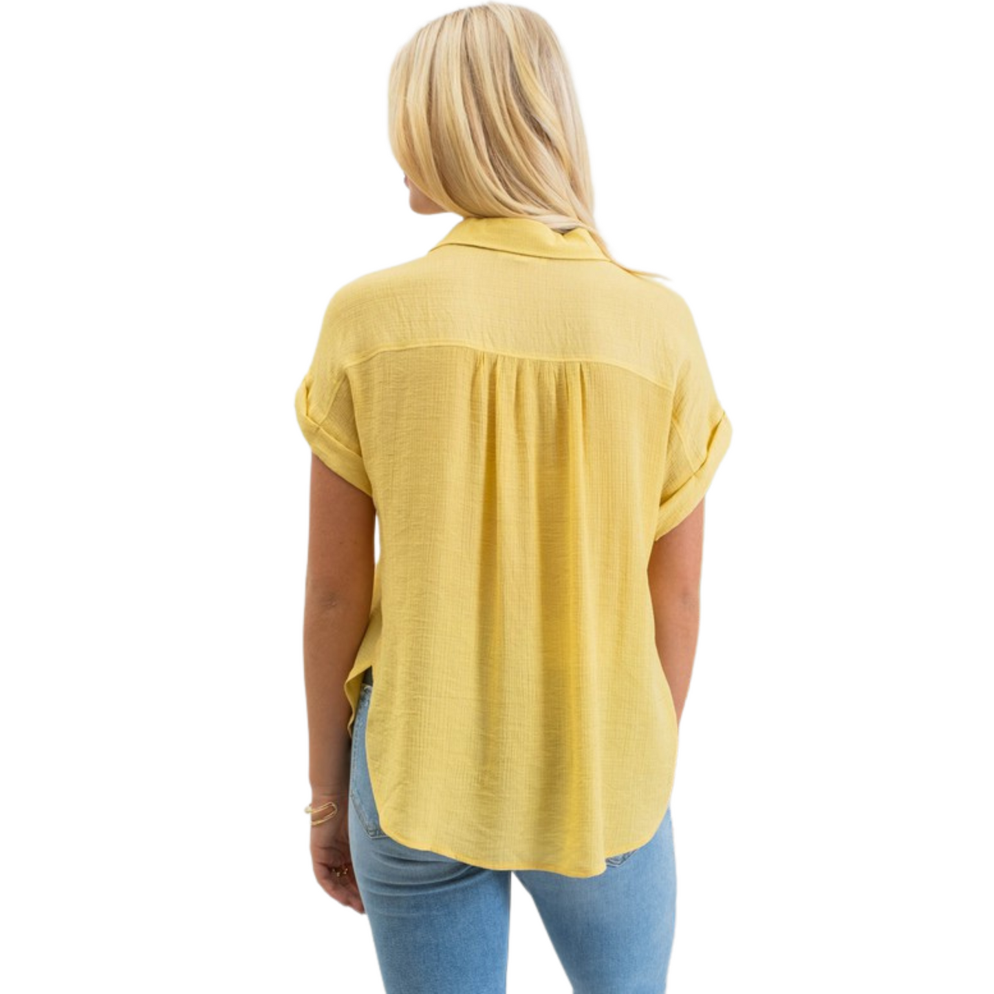 Upgrade your wardrobe with our Mid Button Down Woven Top. Featuring a pointed collar, functional buttons on the front, and folded cuff short sleeves, this top offers a polished and professional look. The back yoke and shirring detail add a touch of style while the dusty yellow color brings a pop of color. Not lined for comfortable wear.