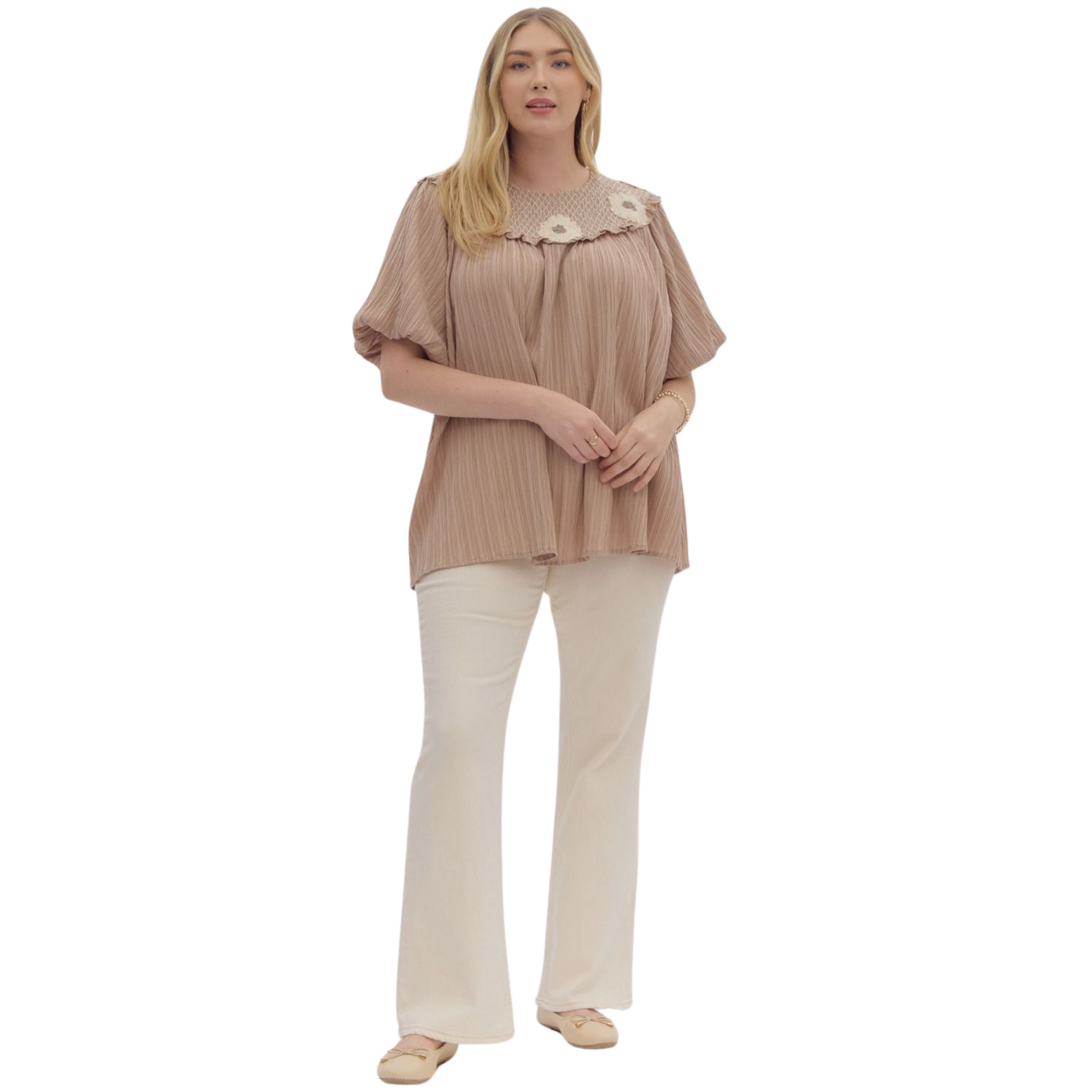 Upgrade your wardrobe with our Bubble Sleeve Embroidered Top. Made of lightweight woven fabric, it features a solid textured round neck with smocking and stitching detail, elastic cuffs, and a non-sheer finish. The gorgeous mocha color will add a touch of sophistication to any outfit. Perfect for both casual and formal occasions.