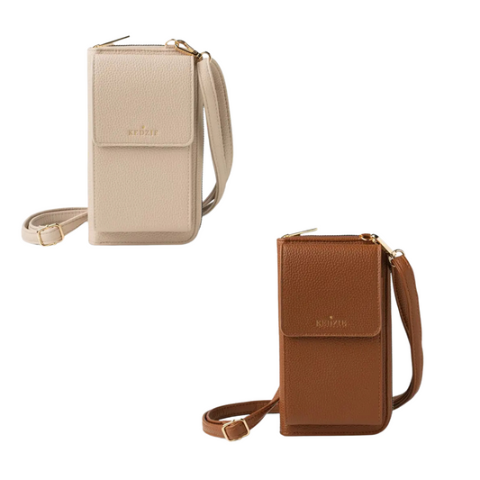 The Eclipse Smartphone Crossbody by Kedzie offers a chic and compact solution for carrying your phone and essentials. Available in both chestnut and beige, this small crossbody is perfect for on-the-go versatility. Stay stylish and organized with the Eclipse Smartphone Crossbody.