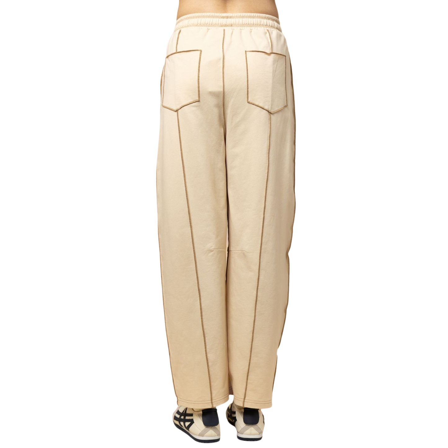 Elevate your everyday look with these Stitch Detail Knit Pants by Very J. Crafted in a soft, neutral ecru tone, these trousers feature distinctive stitch detailing that adds texture and visual interest to a timeless silhouette. Perfect for layering or wearing solo, they offer comfort and style for any occasion. The knit fabric provides flexibility and breathability, making them an ideal choice for all-day wear.