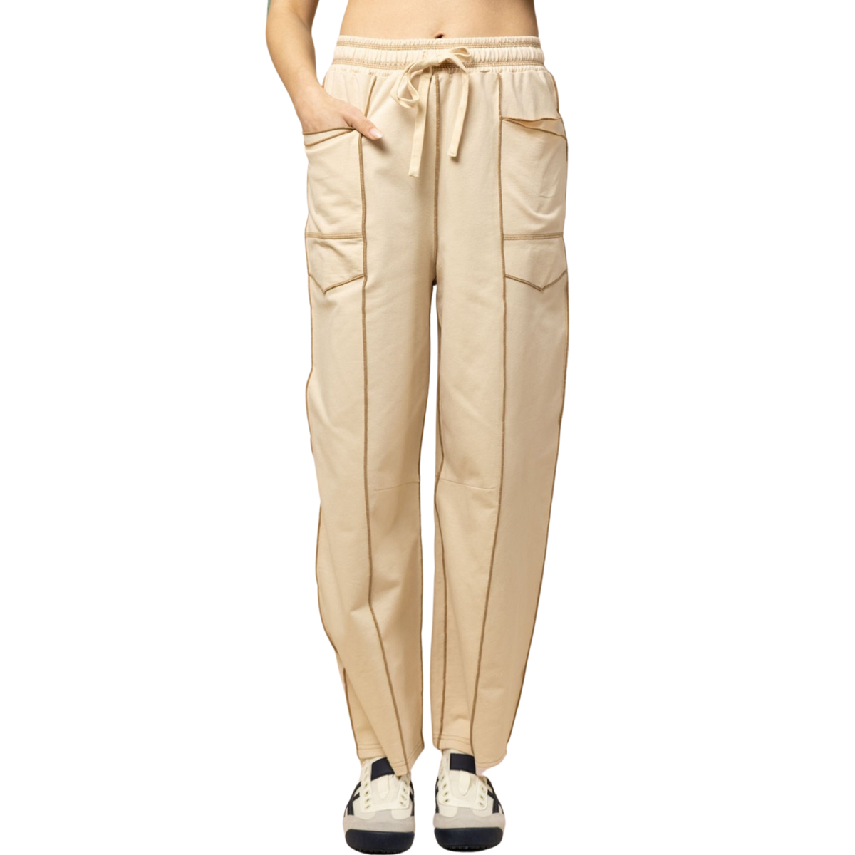 Elevate your everyday look with these Stitch Detail Knit Pants by Very J. Crafted in a soft, neutral ecru tone, these trousers feature distinctive stitch detailing that adds texture and visual interest to a timeless silhouette. Perfect for layering or wearing solo, they offer comfort and style for any occasion. The knit fabric provides flexibility and breathability, making them an ideal choice for all-day wear.