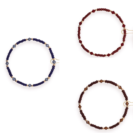 The Eleanor bracelet is a mix of czech glass, 2.5mm gold &amp; swarovski crystal beads. Available in denim, mocha, or burgundy.
