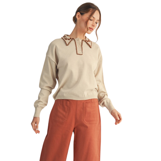Elevate your wardrobe with the Jodifl Embroidered Polo Sweater Top, featuring a classic collared design and long sleeves for a polished look. Expertly crafted with intricate embroidered accents, this sweater top blends style and comfort effortlessly. Perfect for layering or wearing on its own, it offers a sophisticated touch to any outfit while ensuring a comfortable fit throughout the day. Ideal for those seeking refined casual wear with a distinct, embroidered detail.