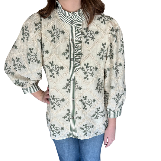 This olive-colored Embroidered Puff Sleeve Top from Entro combines delicate floral embroidery with refined design details. Its 3/4 puff sleeves and contrast striped ruffled collar create an elegant silhouette, while the button-front placket and striped cuffs with button closure add tailored refinement. Crafted from lightweight woven fabric and fully lined, it offers comfortable, non-sheer coverage ideal for polished, versatile styling.
