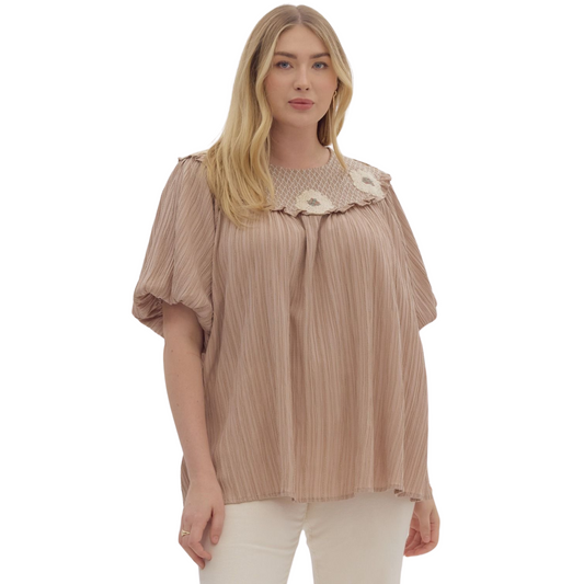 Upgrade your wardrobe with our Bubble Sleeve Embroidered Top. Made of lightweight woven fabric, it features a solid textured round neck with smocking and stitching detail, elastic cuffs, and a non-sheer finish. The gorgeous mocha color will add a touch of sophistication to any outfit. Perfect for both casual and formal occasions.