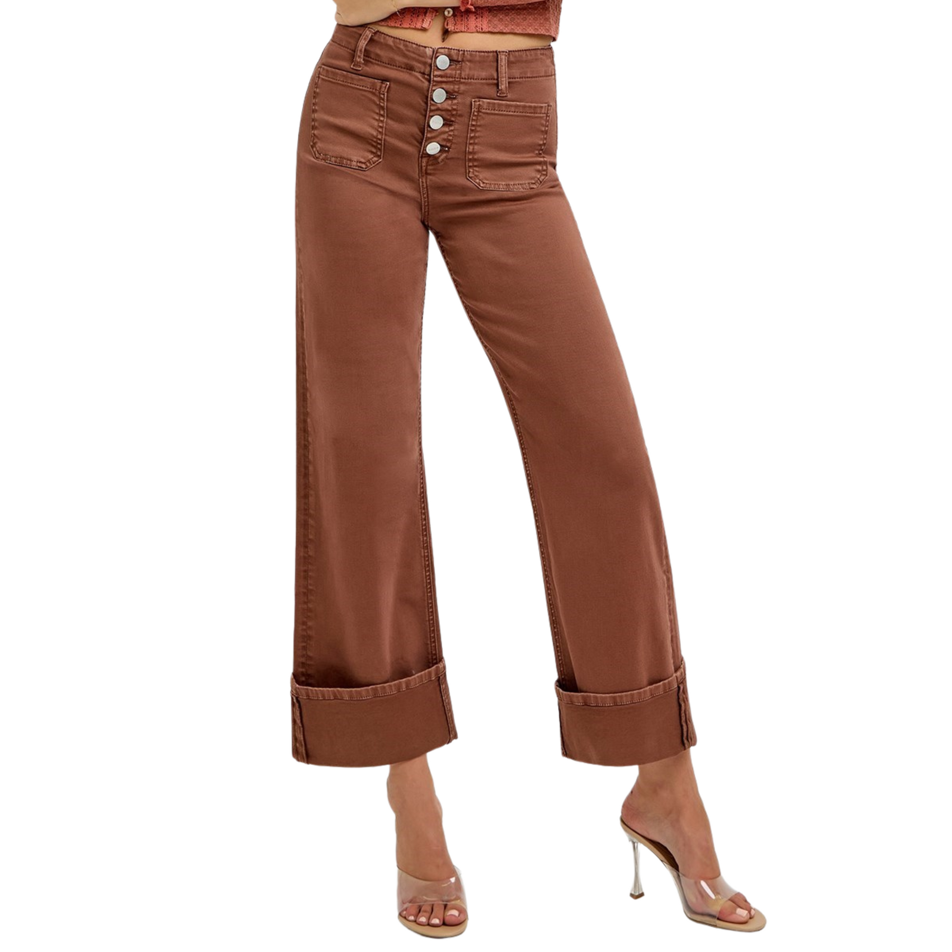 Introducing the Risen High Rise Wide Leg Cuffed Denim. This cropped, espresso colored denim features a wide leg design, perfect for any occasion. Complete with a patch pocket for added convenience and style. Upgrade your wardrobe with this versatile and trendy denim.