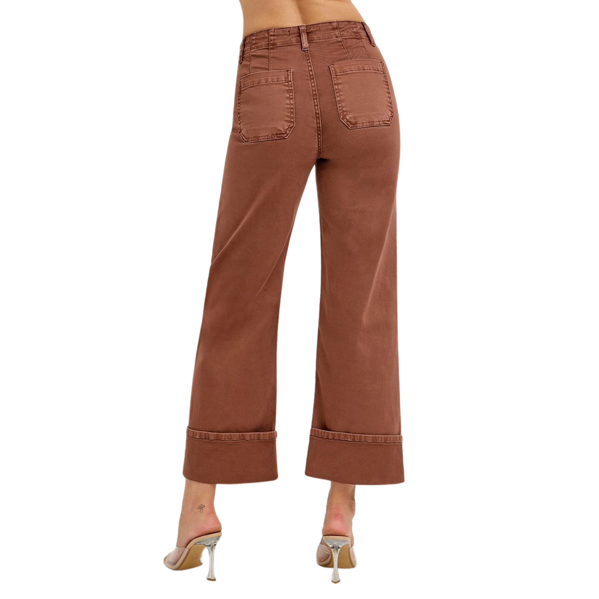 Introducing the Risen High Rise Wide Leg Cuffed Denim. This cropped, espresso colored denim features a wide leg design, perfect for any occasion. Complete with a patch pocket for added convenience and style. Upgrade your wardrobe with this versatile and trendy denim.