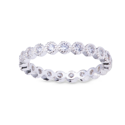 This Circles Eternity Ring is crafted in silver and lined with dazzling rhinestones. Available in sizes 7, 8, and 9, this ring is a timeless and elegant addition to any jewelry collection. Perfect for any occasion, this ring will add a touch of sophistication to any outfit.