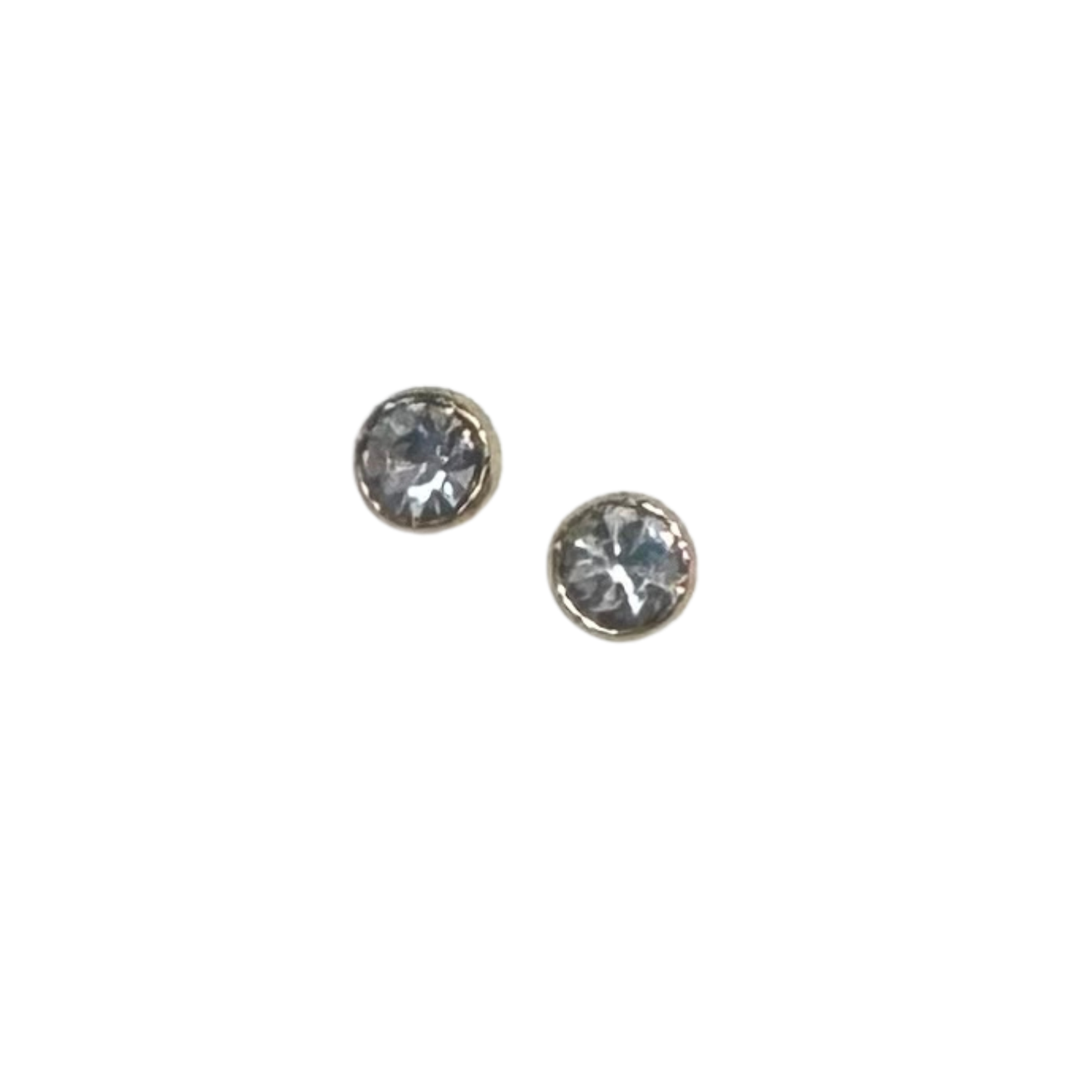 Elevate your everyday look with these delicate Small Rhinestone Studs from été brand. Crafted in lustrous gold, these timeless studs feature sparkling rhinestones that catch the light beautifully. Perfect for adding a touch of subtle glamour to any occasion, whether you're heading to the office or out for the evening. The classic design pairs effortlessly with any outfit, making them a versatile staple for your jewelry collection.
