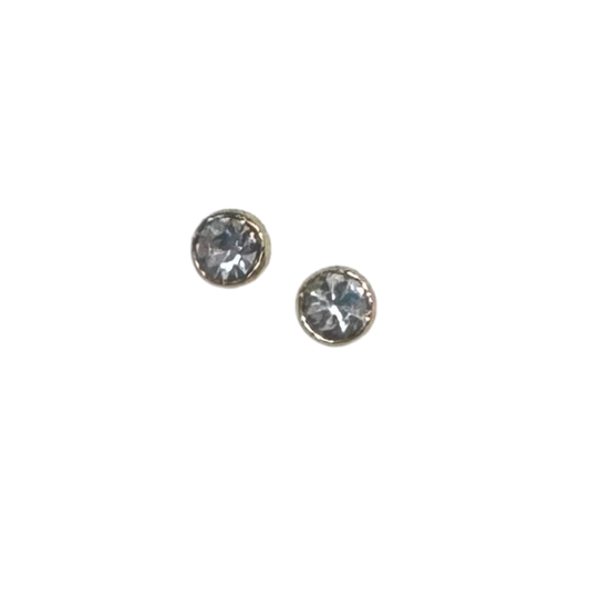 Elevate your everyday look with these delicate Small Rhinestone Studs from été brand. Crafted in lustrous gold, these timeless studs feature sparkling rhinestones that catch the light beautifully. Perfect for adding a touch of subtle glamour to any occasion, whether you're heading to the office or out for the evening. The classic design pairs effortlessly with any outfit, making them a versatile staple for your jewelry collection.