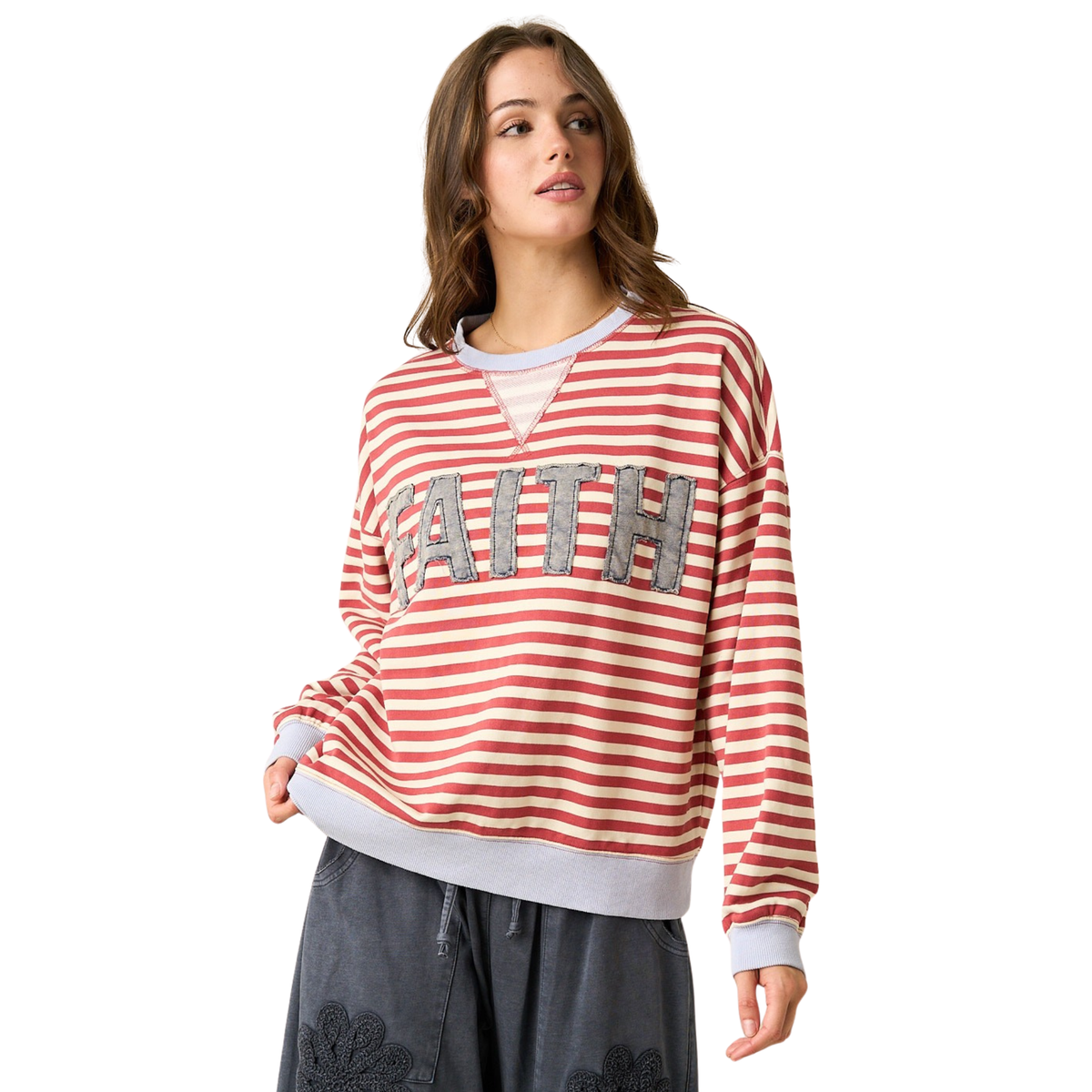 Cozy long sleeve sweatshirt featuring a striking striped design in rich red tones. This Mittoshop piece showcases a meaningful "Faith" patchwork detail that adds character and depth to your everyday wardrobe. Perfect for layering or wearing solo, it combines comfort with intentional style for a look that feels both personal and polished.