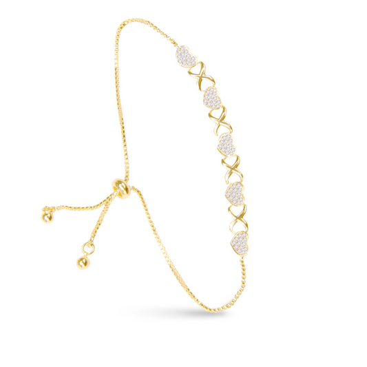 This Pave Heart Adjustable Bracelet is crafted in gold and features rhinestone accents for a touch of sparkle. The pull chord adjustment allows for a perfect fit, while the five heart design symbolizes love and affection. A must-have accessory for any outfit.