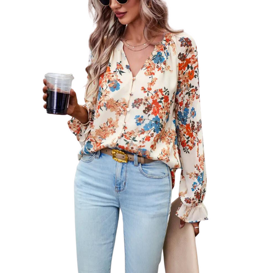Our Floral Button Down Top will add a touch of elegance to any outfit. Its subtle floral print, button down closure, long sleeves and v neck create a sophisticated look perfect for any occasion.