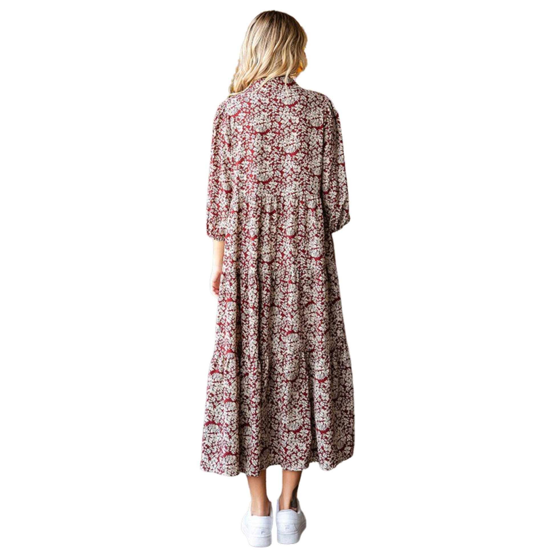 This burgundy midi dress will have you looking stylish in any occasion. Constructed of a lightweight material, the Floral Print Midi Dress features a tiered maxi silhouette highlighted by a classic collared neckline, half button closure on the bodice, and 3/4 sleeves. Elevate your wardrobe with this timeless piece.