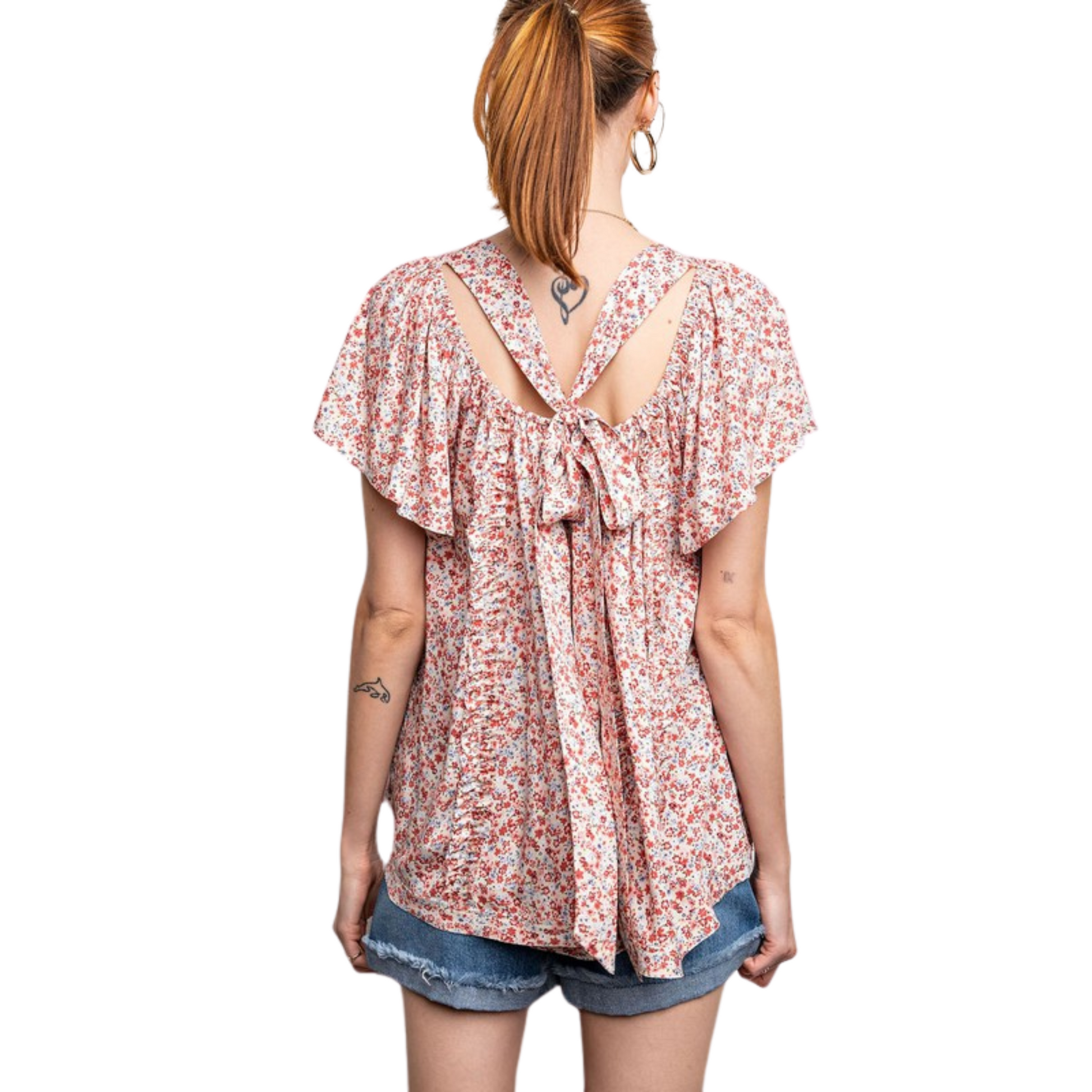 This Floral Printed Rayon Top is an effortless style edition to your wardrobe. It features a beautiful floral print on a lightweight rayon fabric, short sleeves, and a tie back to adjust the fit. The perfect top to keep you comfortable and stylish.