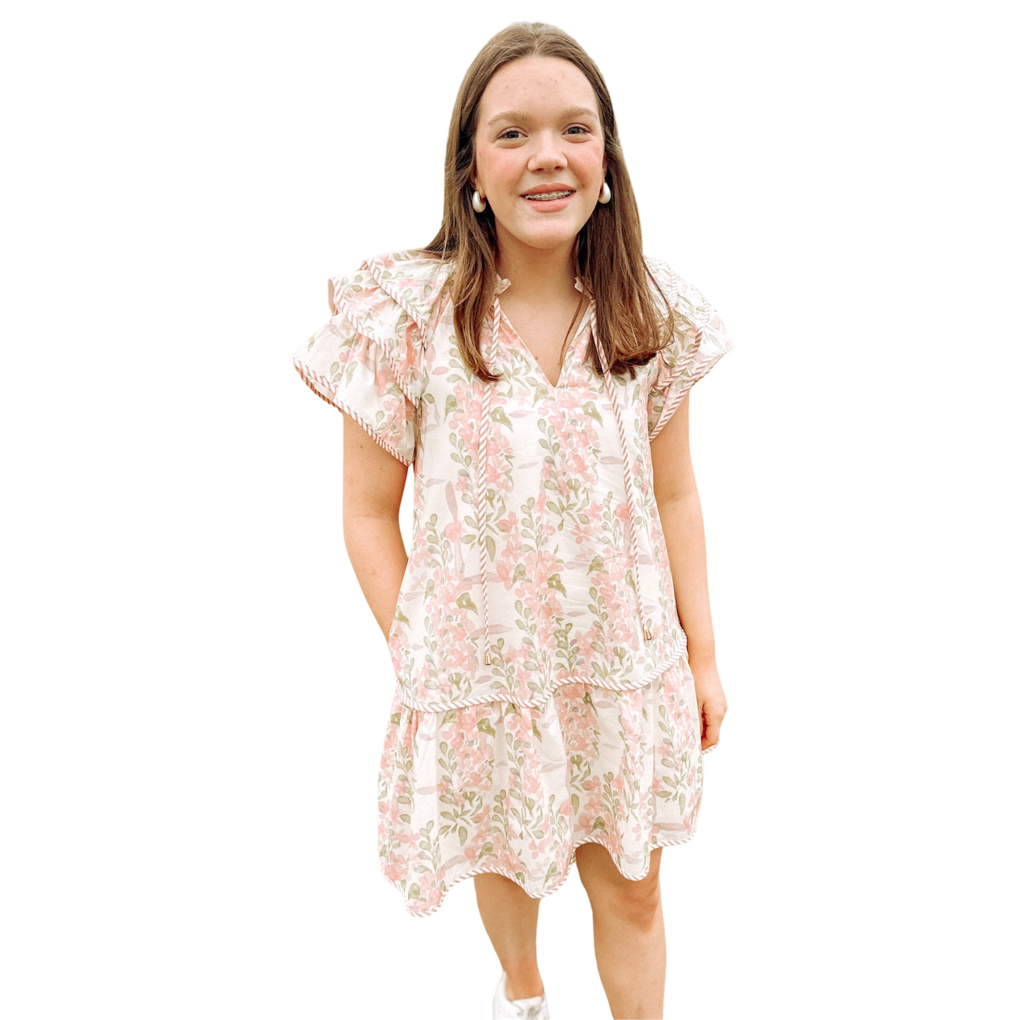 Expertly designed for the modern woman, the Ruffle Sleeve Mini Dress by Entro is a must-have piece for any wardrobe. The floral print and triple layer ruffle sleeves, complete with contrast binding, add a touch of femininity to the lightweight, non-sheer woven fabric. Perfect for any occasion, this dress is both stylish and comfortable.