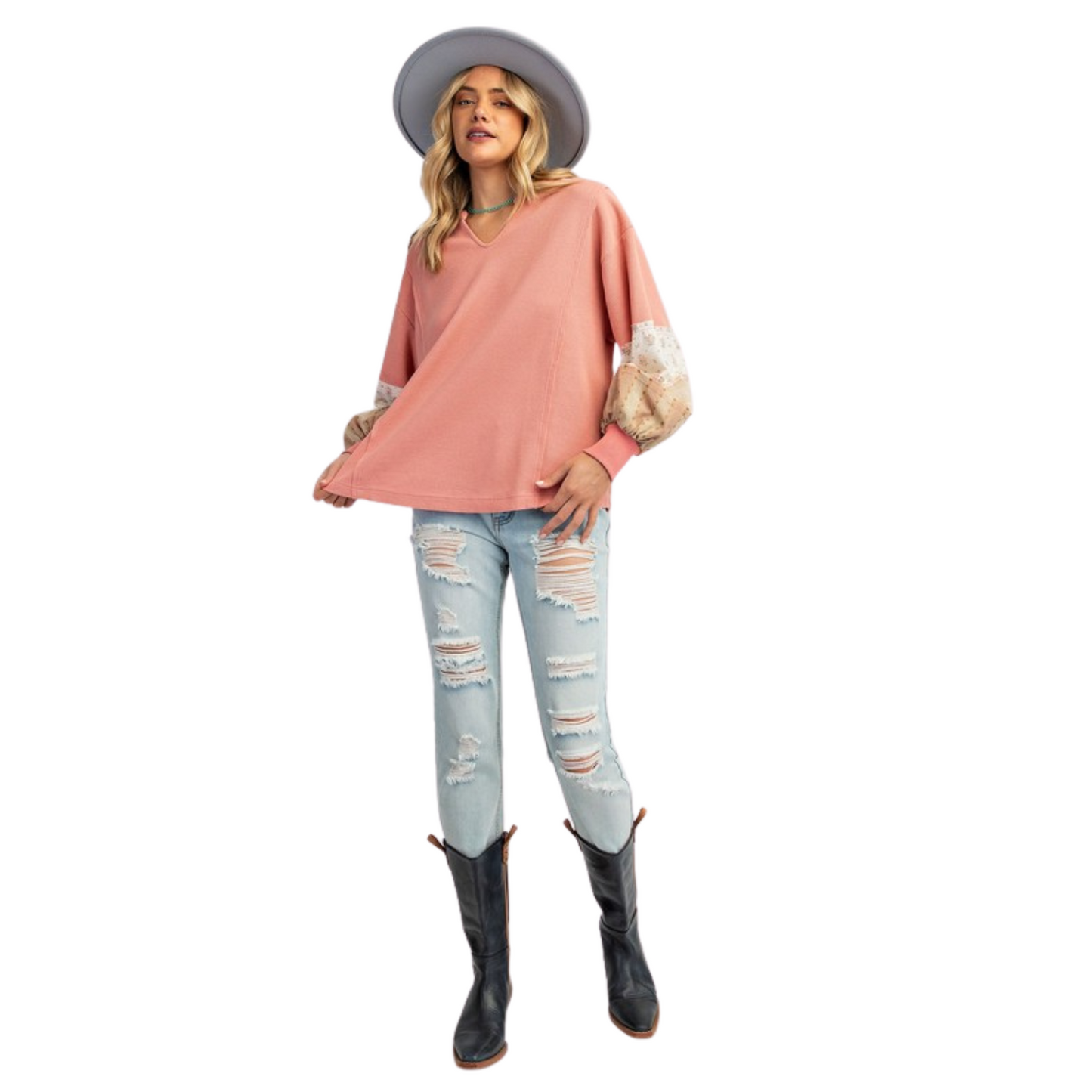 This Mineral Washed Knit Pullover is a must-have for any fashion-savvy individual. The dusty rose color adds a touch of elegance while the floral accents on the sleeves bring a pop of feminine charm. From the reputable brand Easel, this pullover is both stylish and comfortable, making it a versatile addition to any wardrobe.