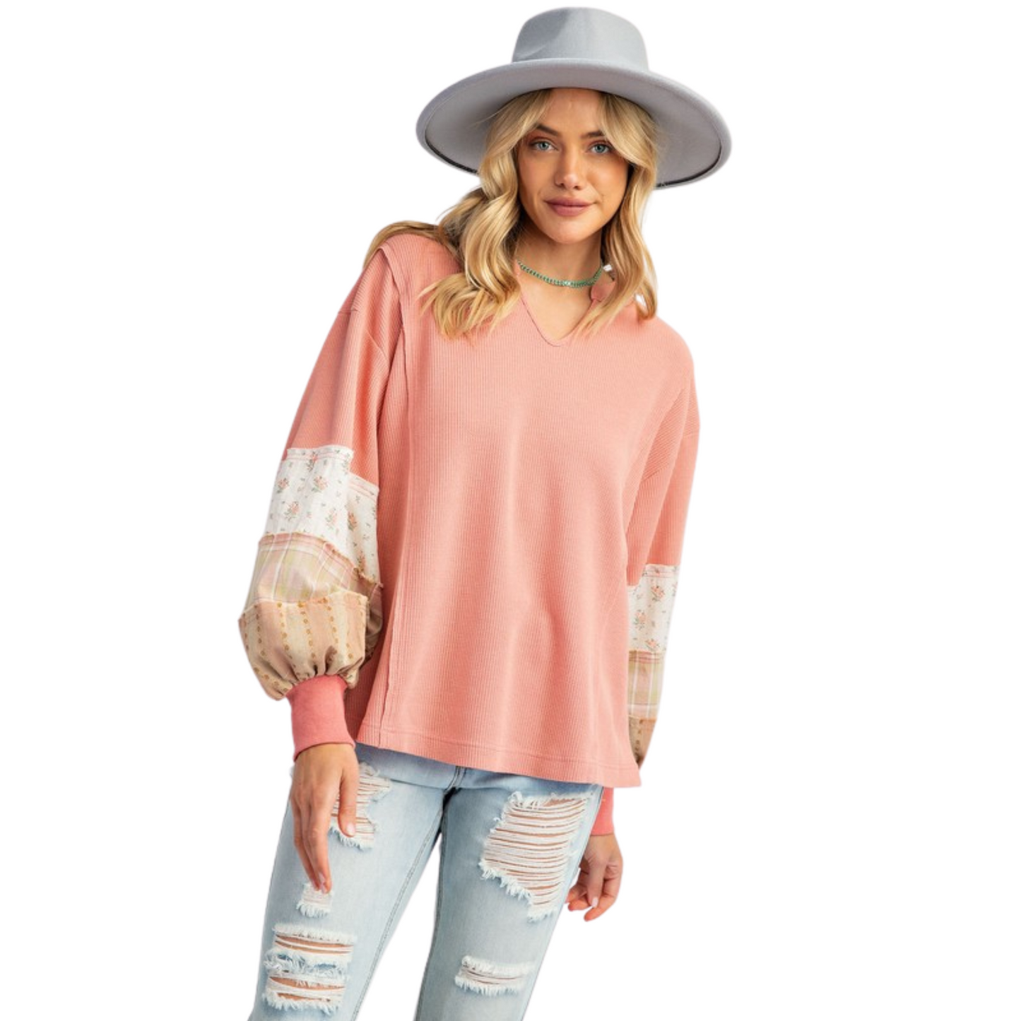 This Mineral Washed Knit Pullover is a must-have for any fashion-savvy individual. The dusty rose color adds a touch of elegance while the floral accents on the sleeves bring a pop of feminine charm. From the reputable brand Easel, this pullover is both stylish and comfortable, making it a versatile addition to any wardrobe.