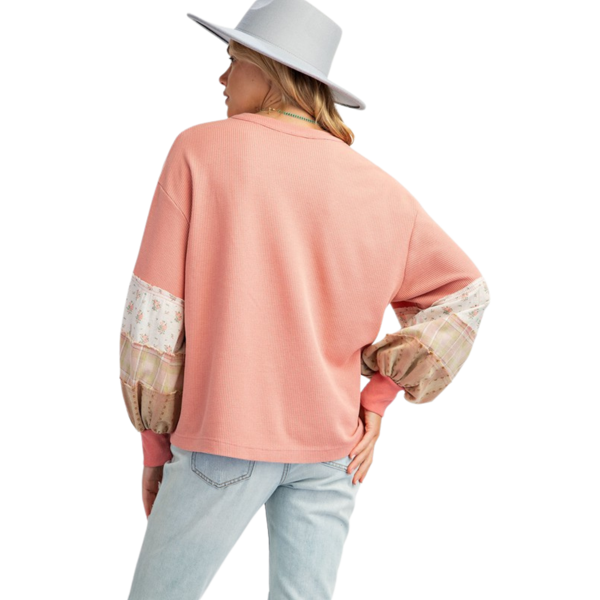 This Mineral Washed Knit Pullover is a must-have for any fashion-savvy individual. The dusty rose color adds a touch of elegance while the floral accents on the sleeves bring a pop of feminine charm. From the reputable brand Easel, this pullover is both stylish and comfortable, making it a versatile addition to any wardrobe.