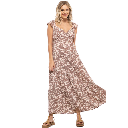 This Floral Tiered Maxi Dress is sure to add a delicate feminine touch to your wardrobe. Made of soft material, the dress features mauve floral pattern all over, finishing with a maxi silhouette. Perfect for any formal occasions.