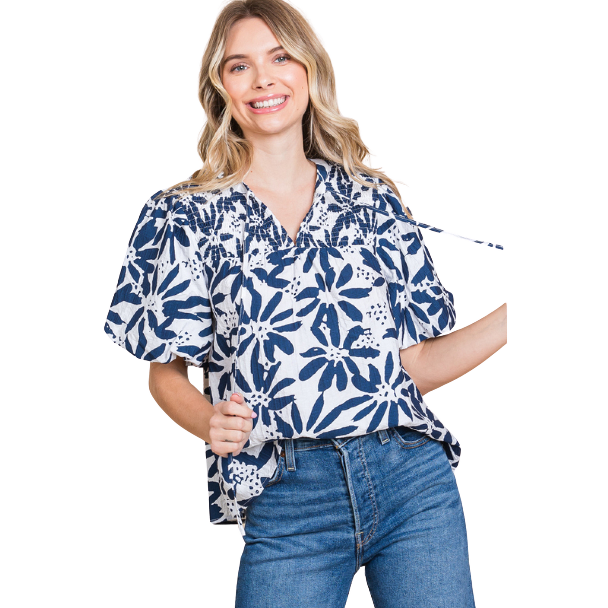 This Floral Smocked Tie Top features a charming flower print and a stylish self-tie neck. The smocked yoke adds a touch of texture, and the short puffed sleeves provide a feminine touch. Made of lightweight, non-sheer navy fabric, this top is perfect for any occasion.