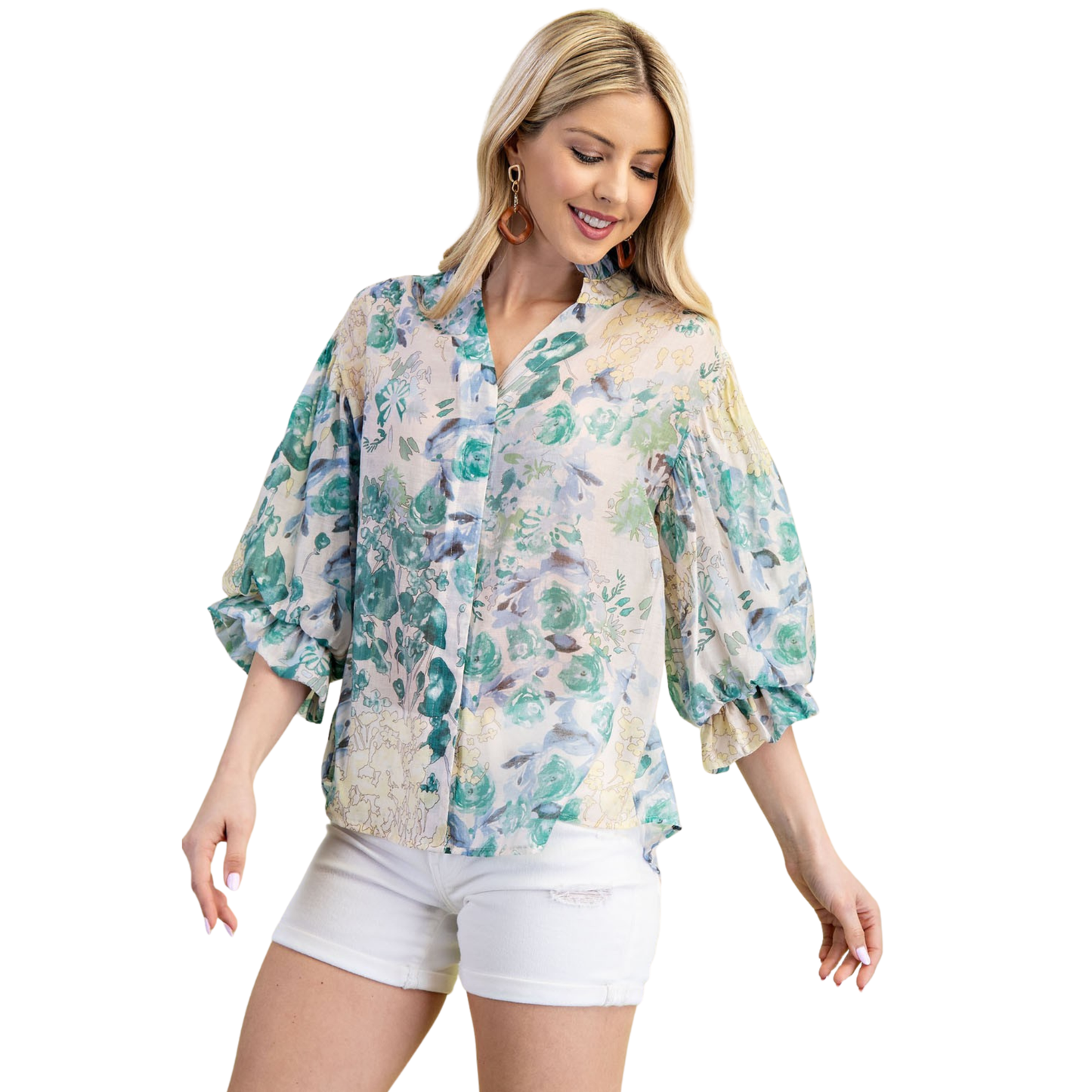 Elevate your wardrobe with this charming GiGio floral button down top. Featuring a vibrant half-sleeve design and delicate floral print, this piece effortlessly transitions from casual days to weekend outings. The classic button-down silhouette offers timeless style with a modern botanical twist. Perfect for layering or wearing solo, this versatile top pairs beautifully with jeans, skirts, or trousers for endless styling possibilities.