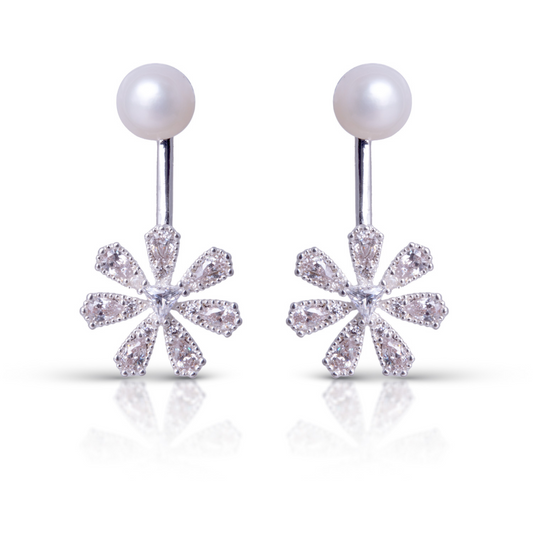 Add a touch of elegance with these Pearl with Rhinestone Flower Drop Earrings. The combination of a classic pearl, sparkling rhinestone flower accent, and silver make these dangle earrings perfect for any occasion. Elevate any outfit and make a statement with these timeless earrings.