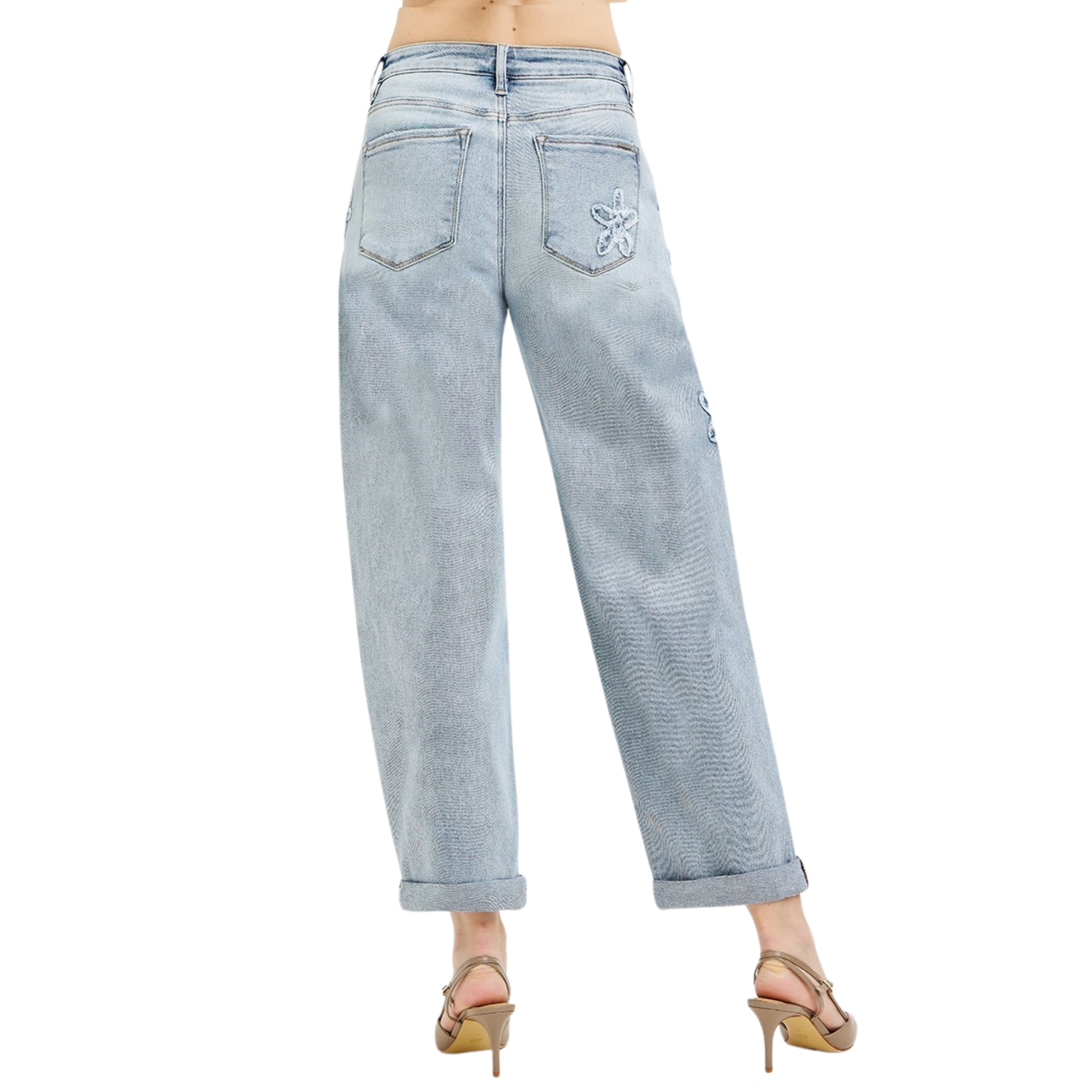 Effortless style meets vintage charm in these Risen cropped barrel jeans. The light wash denim offers a fresh, airy aesthetic perfect for any season, while the relaxed barrel silhouette provides comfortable movement and a modern edge. Delicate flower patch accents add a playful, feminine touch that elevates your everyday look. Pair with sneakers for casual outings or dress up with heels for a night out. A versatile wardrobe essential that bridges casual and chic.