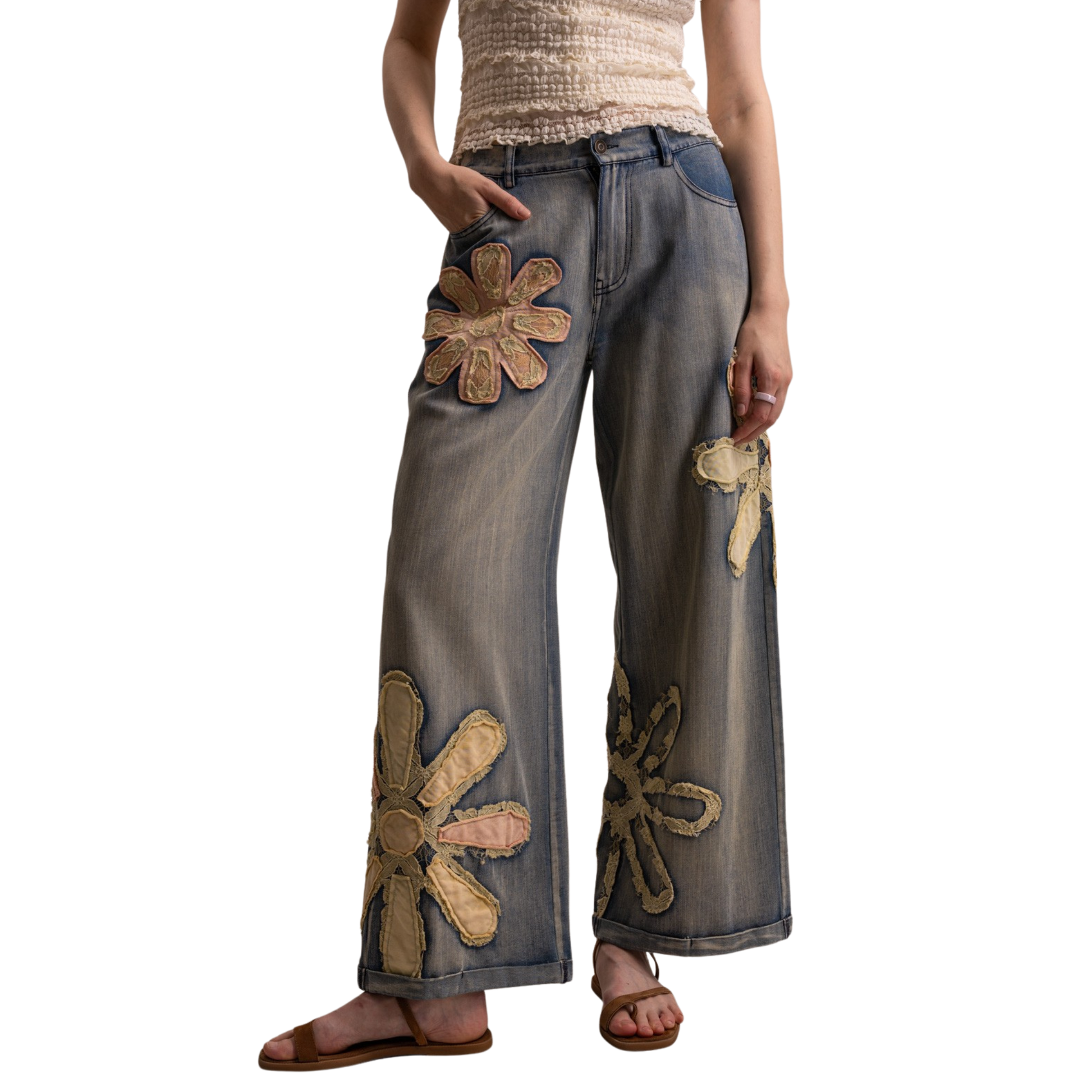 Elevate your denim collection with these stunning wide-leg flower patch pants from Blue Velvet. The relaxed silhouette offers comfort and style, while the eye-catching floral patches add a unique, artistic touch to your everyday look. Perfect for casual outings or making a statement at social gatherings. Crafted for those who appreciate quality and individuality in their wardrobe.