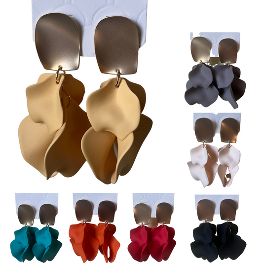 These Flower Petal Dangle Earrings are perfect for adding playful elegance to any look. Available in a variety of colors, they feature lightweight earrings with beautiful petal designs. Whatever your style, these accessories are sure to make a statement.