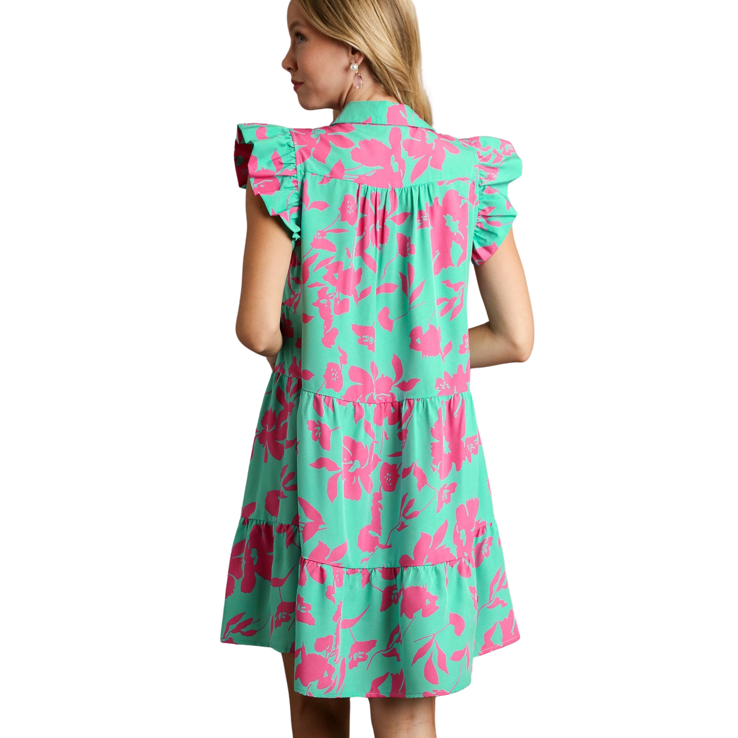 Experience the perfect blend of elegant and playful with our Floral Print Collared Dress. The feminine floral print, v-neckline, and flutter sleeves add a touch of romance, while the tiered design and mini length give it a modern twist. Make a statement with this collared dress for any occasion.