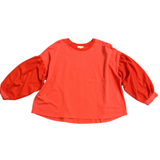 Expertly crafted from French Terry material, this orange red top features a unique waffle knit design and flattering 3/4 length balloon sleeves. Perfect for plus size individuals, this top offers both style and comfort in one versatile piece.