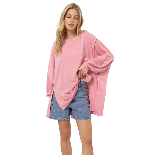 Your Fashion Sense Will Be Rewarded For This French Terry Top. It Features A Crew Neck, Drop Shoulders And Long Balloon Sleeves With Fitted Split Cuffs. The Relaxed Bodice Is Accented With Side Slits, Reverse Seam Detailing And A High-Low Hem.