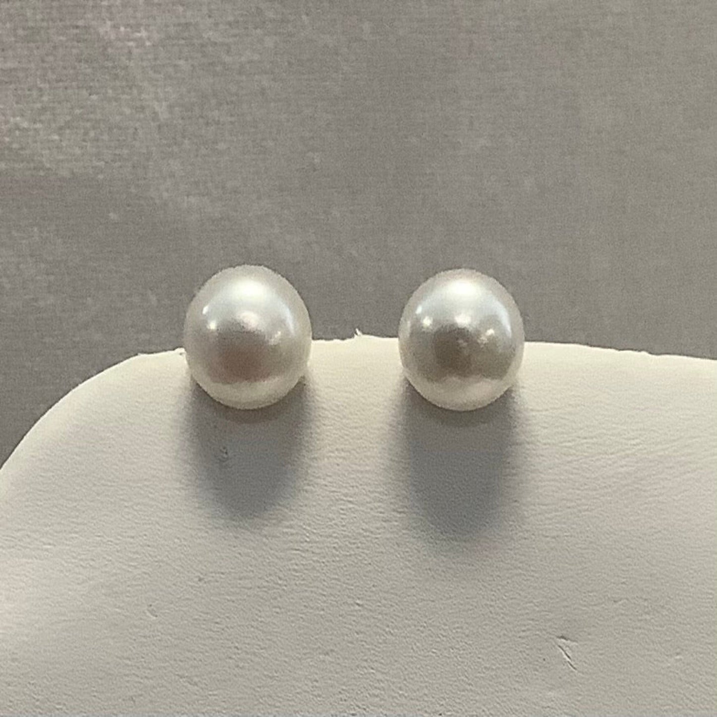 Freshwater pearl stud earrings by Skosh