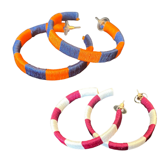Show your team spirit with these Game Day Earrings. Crafted with thread wrapping and large hoops, these earrings are the perfect accessory to wear during the game. Choose from a two-tone combination of orange/blue or crimson/white, to show your support in style.
