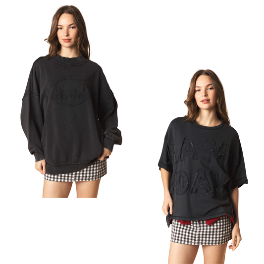 Elevate your game day spirit with these striking black tops from Peach Love. Featuring bold, eye-catching graphics that celebrate the energy and excitement of match day, these pieces are designed for fans who want to stand out in the crowd. Perfect for tailgates, watch parties, or showing your team pride anywhere. Comfortable, versatile, and made to make a statement.