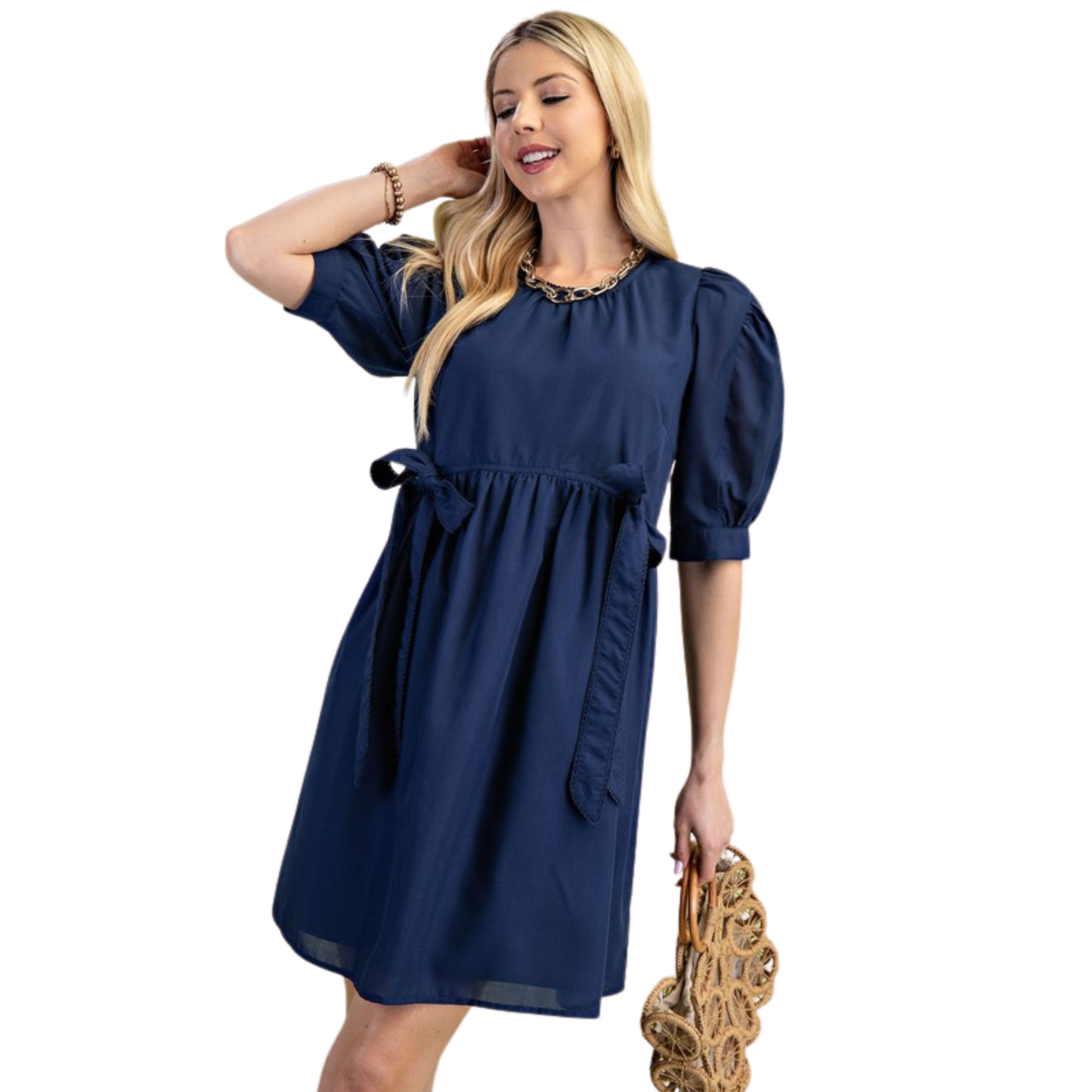 Elevate your wardrobe with this charming navy mini dress from GiGio. Featuring romantic puff sleeves and a classic round neckline, this piece effortlessly transitions from day to night. The flattering silhouette and timeless color make it a versatile staple for any occasion. Perfect for creating polished, feminine looks with minimal effort.