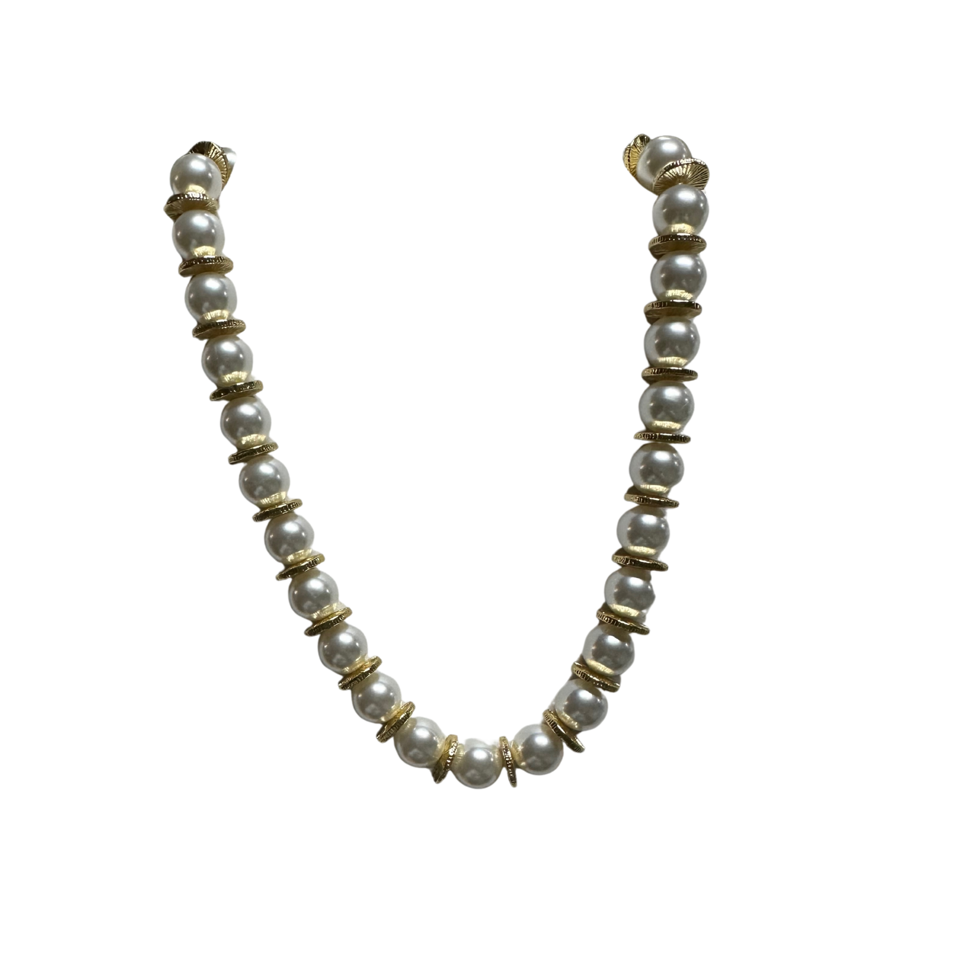 Elevate your everyday elegance with this refined pearl necklace from Perdido Gems. Featuring lustrous pearls complemented by delicate gold accents, this short-length piece offers versatile styling for both casual and formal occasions. The expert craftsmanship showcases the natural beauty of premium pearls while the gold detailing adds a touch of sophisticated luxury. A timeless investment piece that transitions seamlessly from day to evening wear.