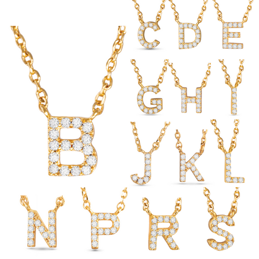 This stylish and elegant Cubic Zirconia Initial Necklace features 14K gold plating and sparkling rhinestone accents. Choose from a variety of letters to personalize your look. Made with high-quality materials, this necklace is sure to add a touch of glamour to any outfit.