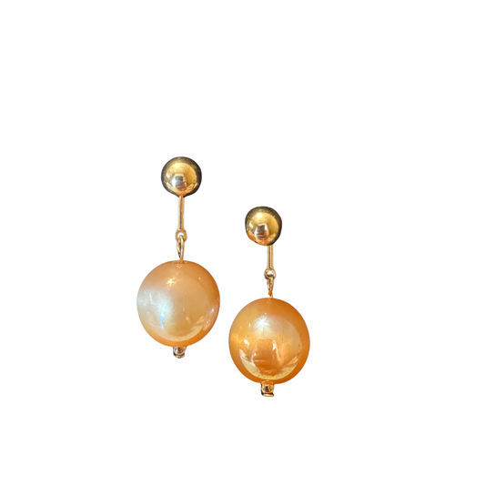 Elevate your jewelry collection with these exquisite gold dangle earrings from Perdido Gems. Featuring lustrous ball accents that catch light beautifully, these pieces offer sophisticated movement and timeless elegance. The carefully crafted design balances delicate proportions with substantial presence, making them versatile enough for everyday wear yet refined enough for special occasions. Perdido Gems' commitment to quality ensures lasting beauty and durability.