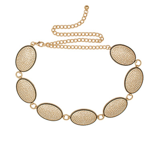 Elevate your style with this stunning Gold Rhinestone Belt from Golden Stella. Crafted with luxurious gold toning and adorned with sparkling rhinestone accents, this belt adds instant glamour to any outfit. Perfect for dressing up casual wear or completing a sophisticated look, the eye-catching rhinestone details catch the light beautifully. A versatile accessory that brings elegance and sparkle to your wardrobe.
