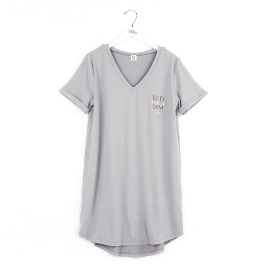 Our Bed Before 9PM Sleep Shirt is the perfect choice for a comfortable night's rest! Made with butter soft fabric, it's designed for maximum comfort and movement. Look and feel your best with this stylish and cozy sleep shirt.