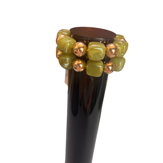 Elevate your everyday style with this stunning Large Beaded Bracelet from Perdido Gems. Crafted with vibrant green beads and gleaming gold accents, this piece combines natural beauty with timeless elegance. The stretchy design ensures a comfortable, adjustable fit for any wrist size, making it perfect for layering or wearing solo. Whether you're dressing up for a special occasion or adding a pop of color to your casual look, this bracelet is a versatile accessory that complements any wardrobe.