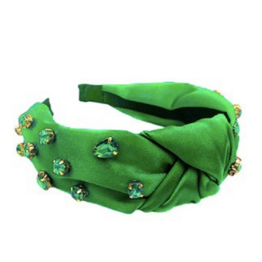 Look and feel beautiful with this bejeweled green headband. It's made with premium materials and designed with vibrant green jewels for a luxurious look. Enhance your style with this eye-catching accessory for any special occasion.